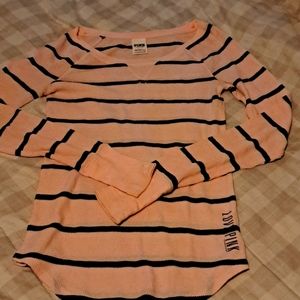 Pink long sleeve shirt. Light pink with black stripes. Size small.